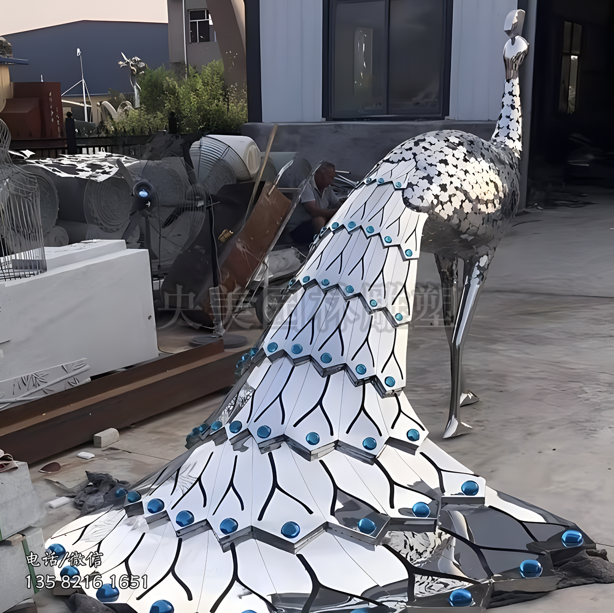 鏡面不銹鋼孔雀雕塑