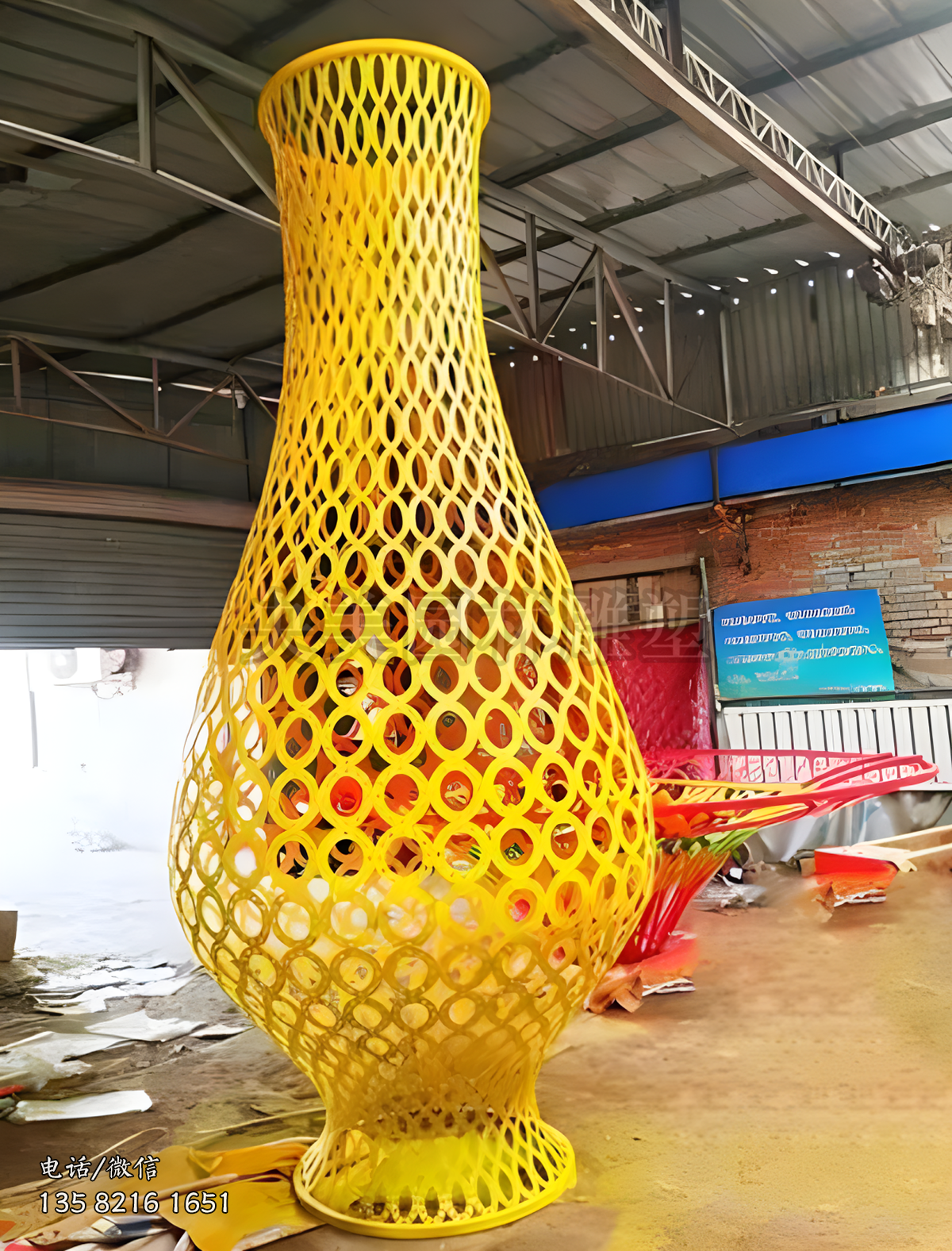 不銹鋼圓圈拼接鏤空花瓶雕塑